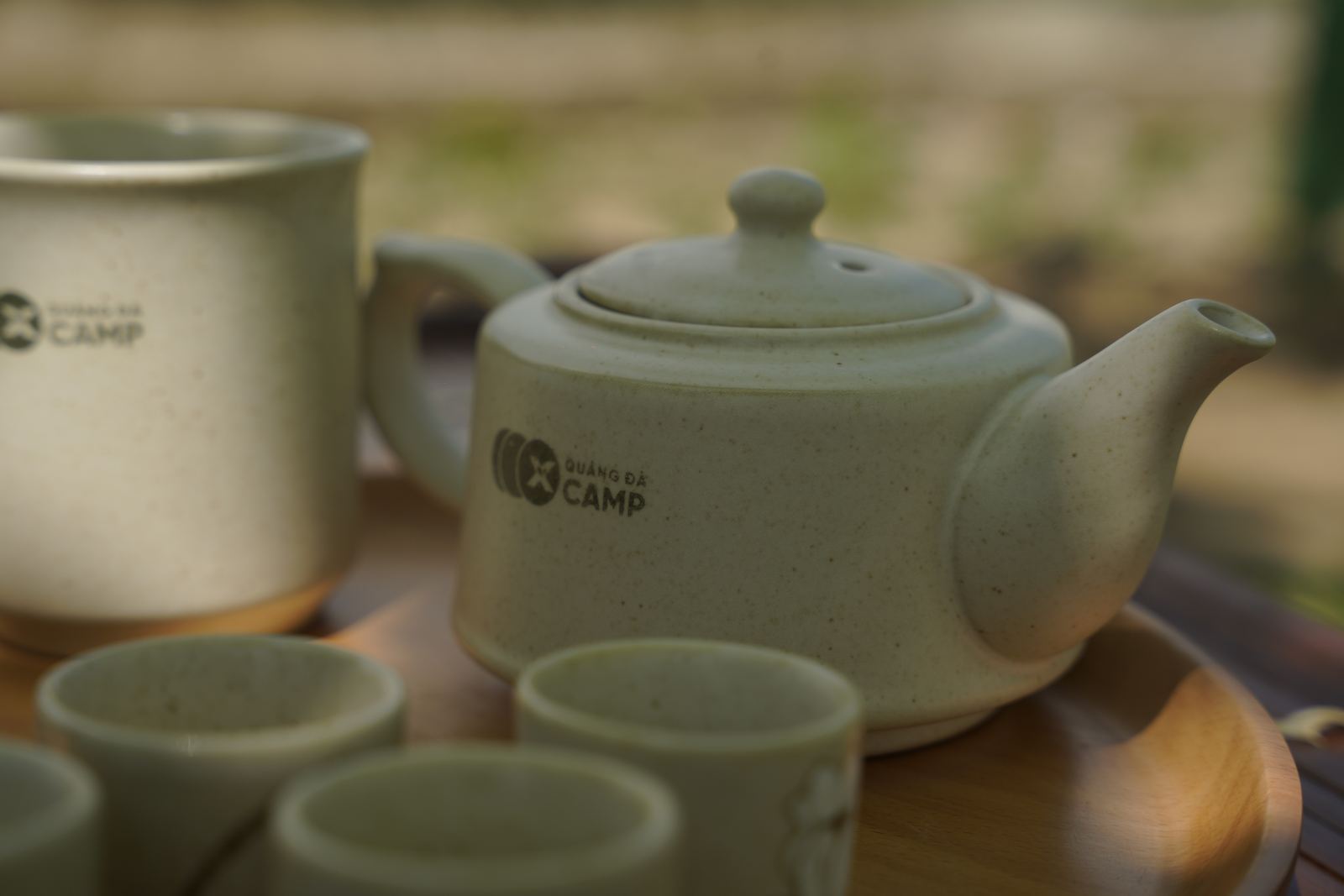 Bộ ấm chén gốm in logo Quảng Đà X-Camp
